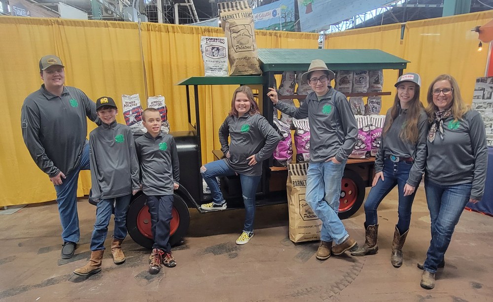 The Potter County Potato Judging Team (left to right:  Lucas Risser, Emmett Long, Silas Batterson, Alexis Risser, Mark Long, Patience Batterson, and coach Thankful Batterson)