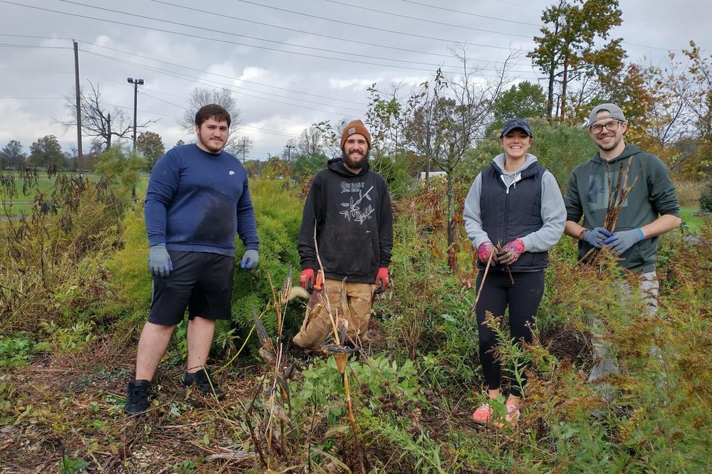 Four Master Gardeners working at the garden