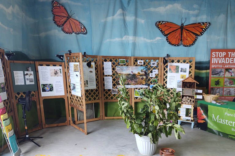 Penn State Master Gardeners of Butler County prepare to teach visitors about pollinators at the Butler Farm Show