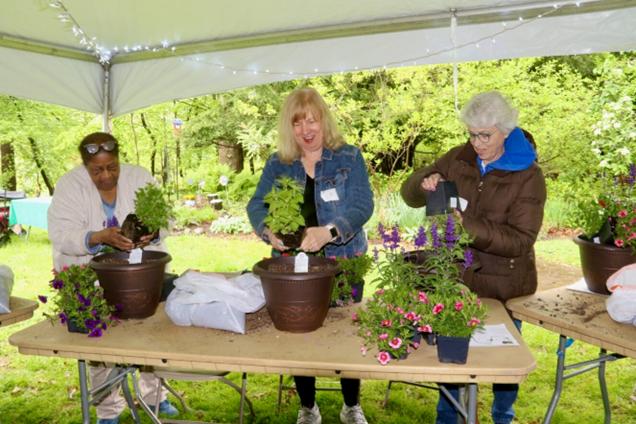 Ladies making plant containers